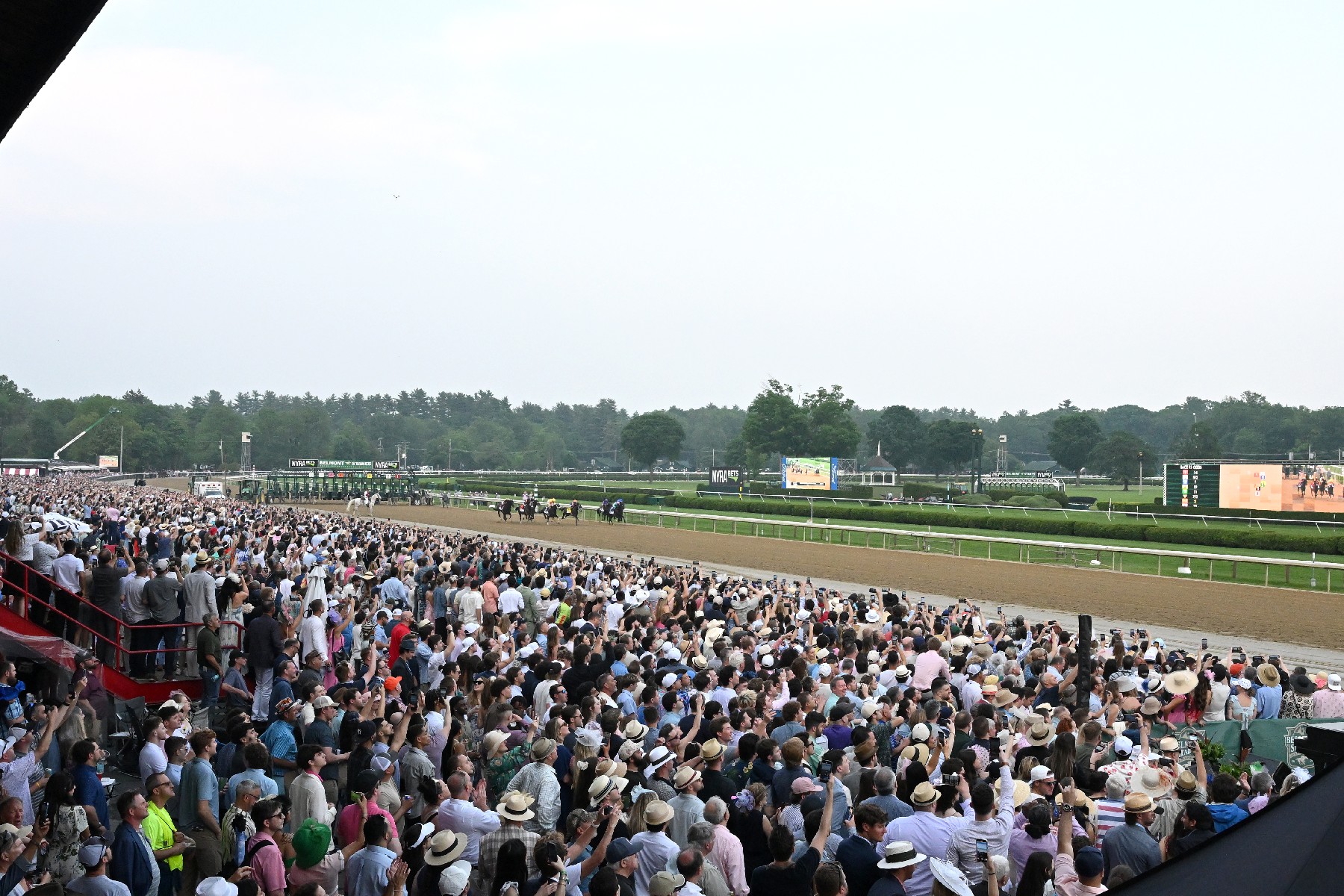 Crowd of people at a horse race